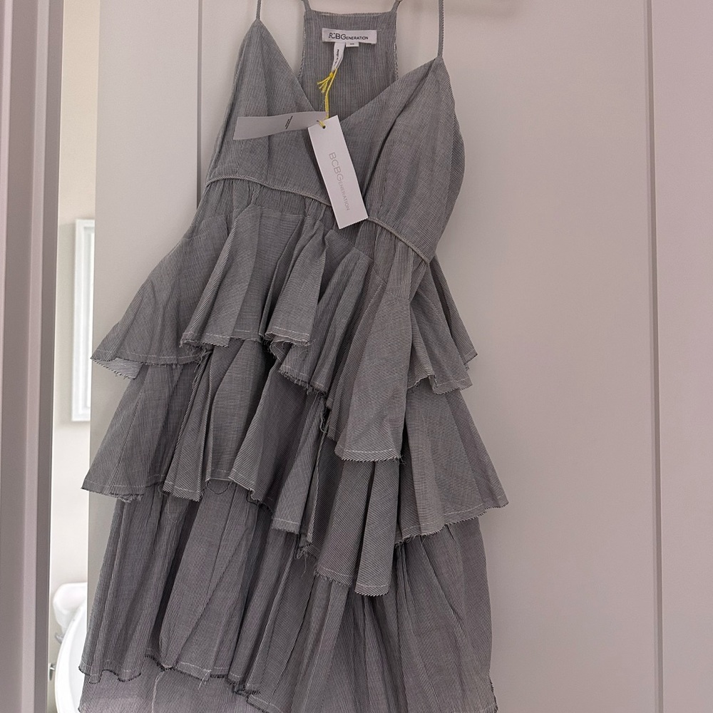BCBGeneration tiered mini dress. Brand new with tags; XS.